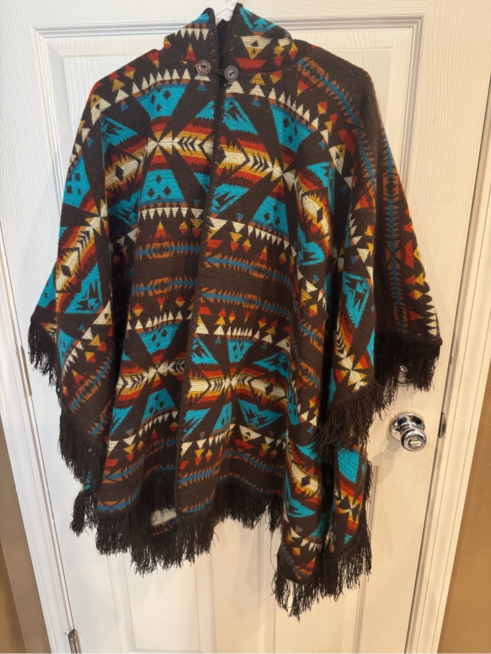 Wrap sweater/poncho with hood, button closure.  Native american / southwest